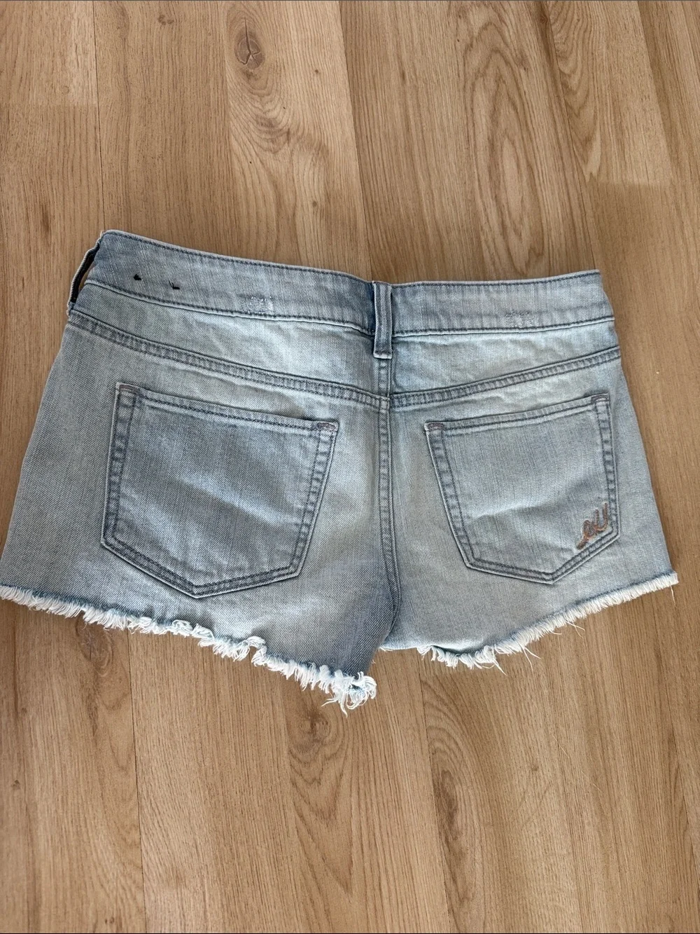 Express Light Blue Distressed Denim Shorts with Striped Underlay